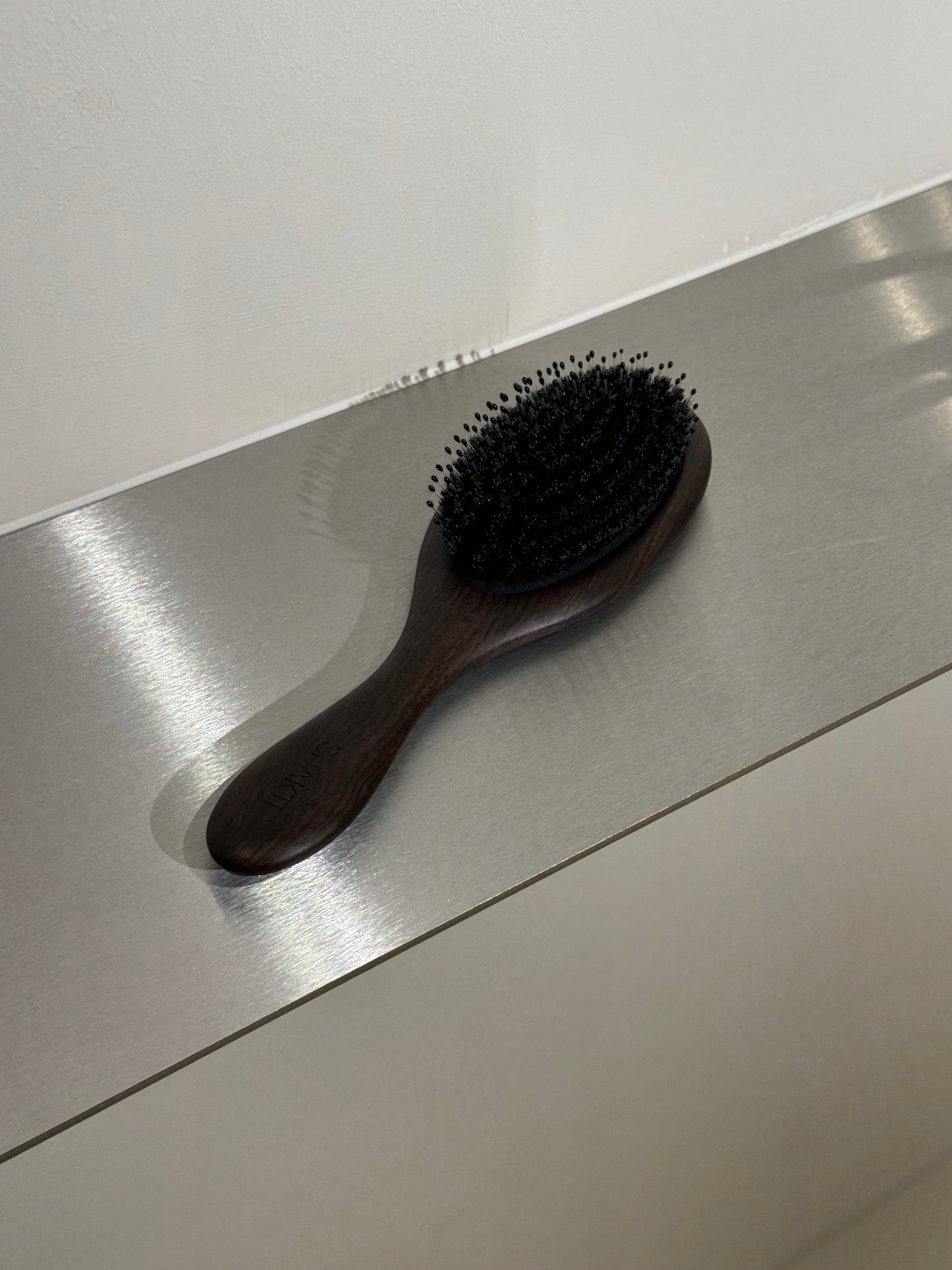 Ebony wood hairbrush